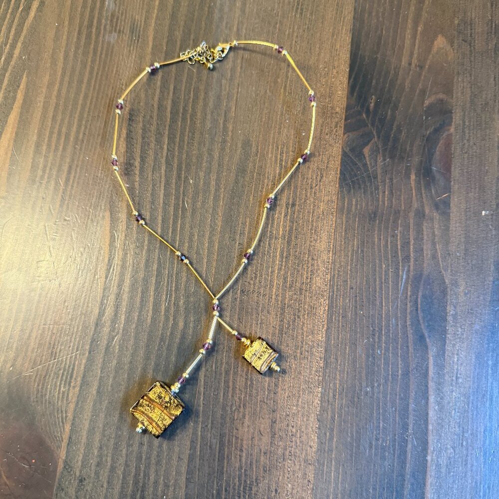 Gold Tone Necklace with Square Pendant Purple Accents